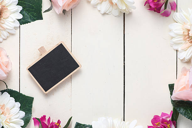 istock Blank wooden sign with spring flowers 522866258