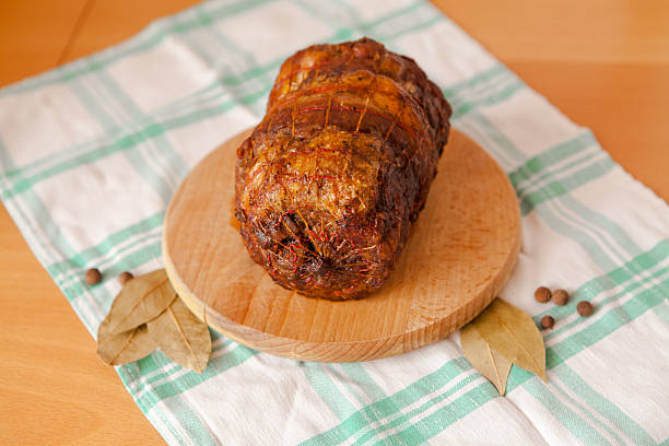 istock Pork meatloaf on wooden cutting board 522867232