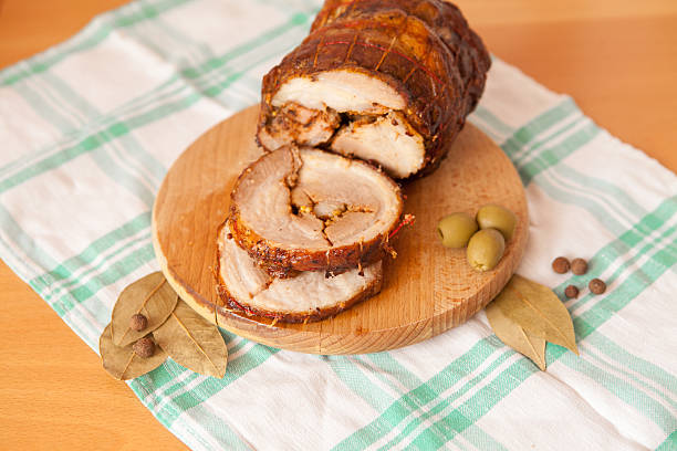 istock Pork meatloaf on wooden cutting board 522867308