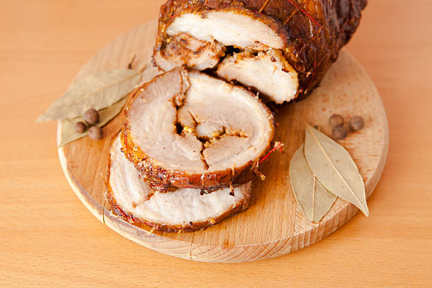 istock Pork meatloaf on wooden cutting board 522867570