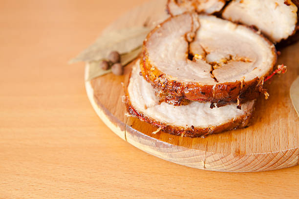 istock Pork meatloaf on wooden cutting board 522867666