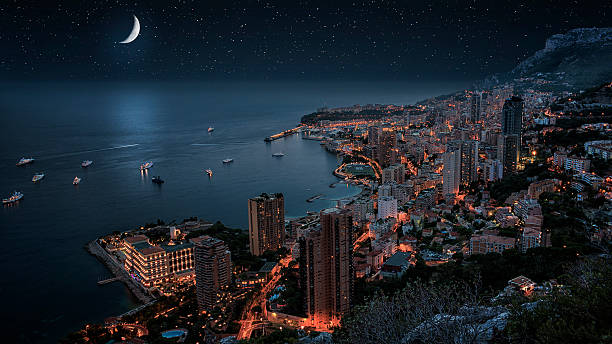 Monaco under the moonllght Monaco monte Carlo in the night monaco stock pictures, royalty-free photos & images