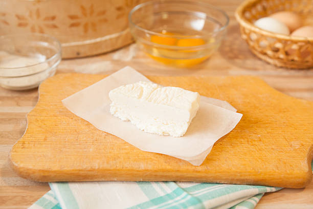 istock Butter on parchment on cutting board and towel 522868364