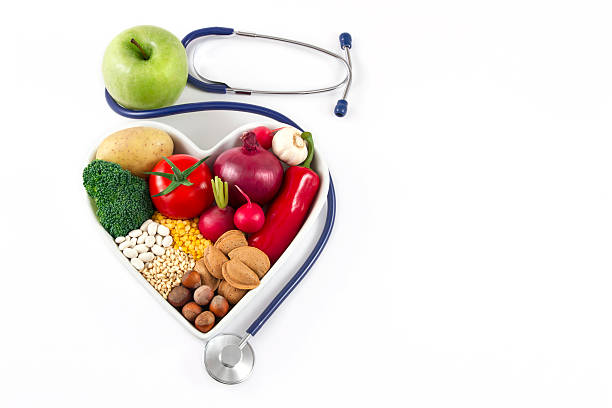 istock Healthy Foods in Heart Shaped with Stethoscope 522872056