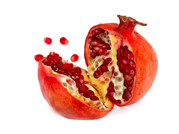 istock Break Juicy Pomegranate Isolated on White Background 522873506