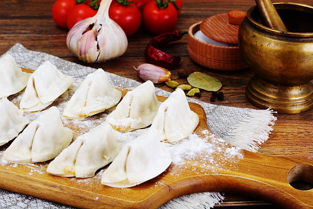 istock Raw Homemade Dumplings, Russian Pelmeni 522873676