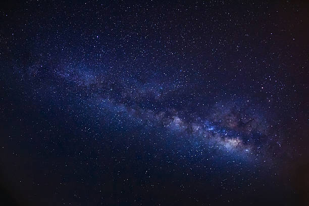 istock milky way galaxy, Long exposure photograph, with grain 522876362