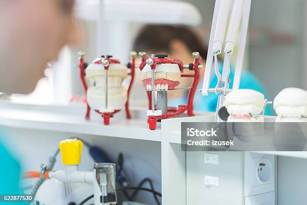 Prosthodontic Lab Focus On Dentures Stock Photo - Download Image Now - Adult, Busy, Dental Equipment