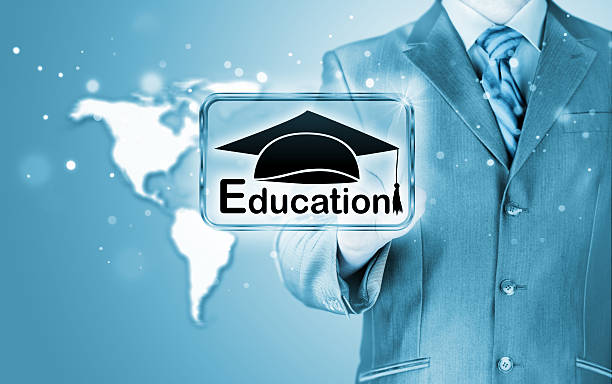 istock business man pointing 'education' concept 522886719