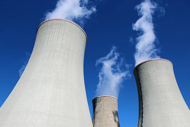 istock three cooling concrete towers of power plant 522887367