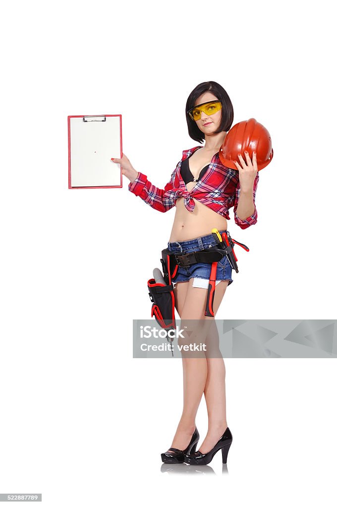 woman builder woman builder with clipboard and helmet on a white background Adult Stock Photo