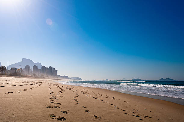 Morning in the Beach Empty Barra da Tijuca Beach in the Morning, Rio de Janeiro, Brazil. barra beach stock pictures, royalty-free photos & images