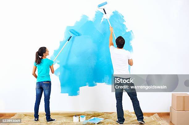 Painting Couple Stock Photo - Download Image Now - Painting - Activity, Couple - Relationship, Wall - Building Feature