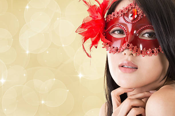 istock beautiful woman in a carnival mask 522893335