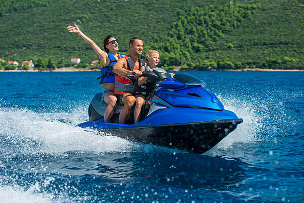 istock Family Riding A Jet Boat 522893595