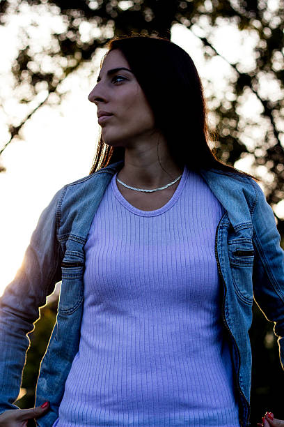 istock Woman enjoying the sunset 522895255