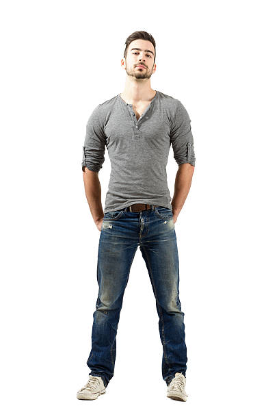 istock Fit male fashion model posing with hands in back pockets 522895471