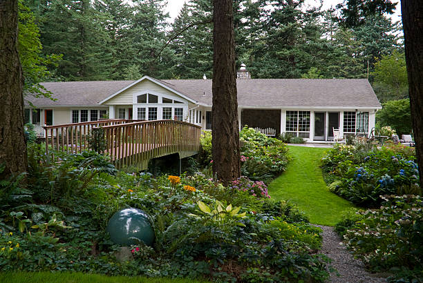 Formal Gardens surround a luxury ranch home stock photo