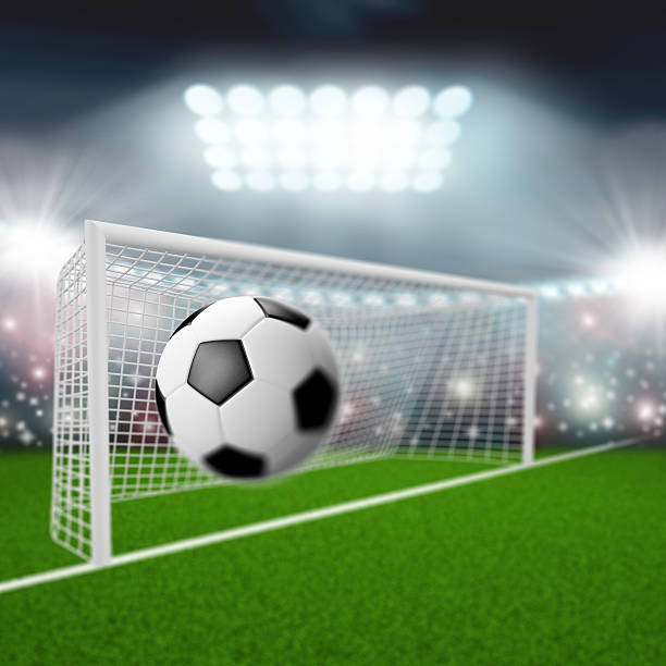 istock soccer ball flies into the goal 522896381