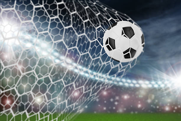 soccer ball in goal net