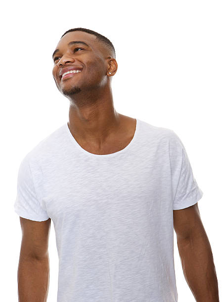 istock Cheerful young man smiling on isolated white background 522898095