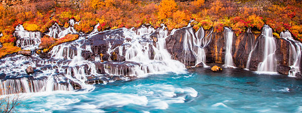 Colourful Waterfall in Iceland Hraunfossar Falls in Iceland, Europe. One of the most colourful waterfalls in the world. hraunfossar stock pictures, royalty-free photos & images