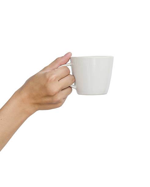 istock Asian teen hand and coffee cup. 522909771