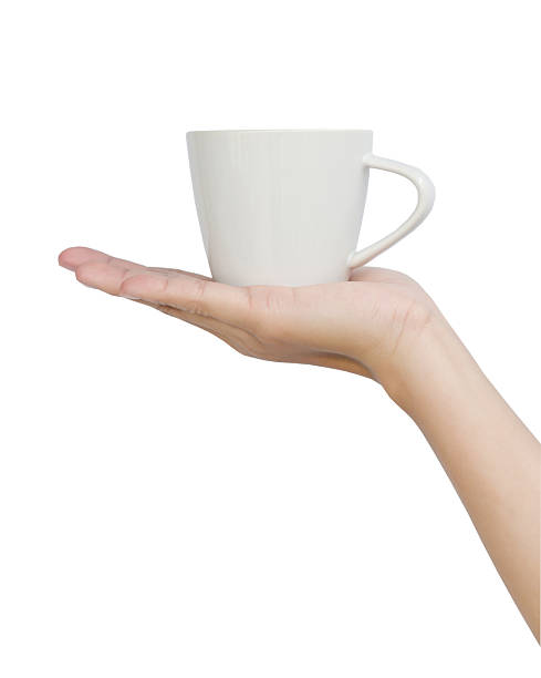 istock Asian teen hand and coffee cup. 522909863