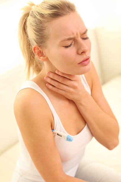 istock Woman With Sore Throat 522911753