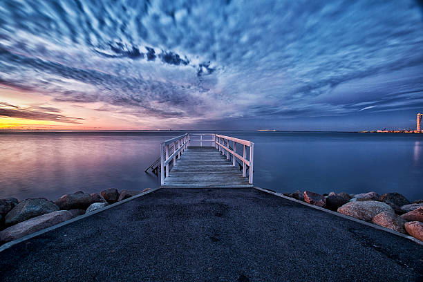 istock old wood bridge pier on sunset 522912911