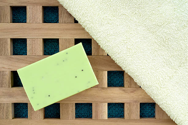 istock bath towels and soap on wooden background 522912983