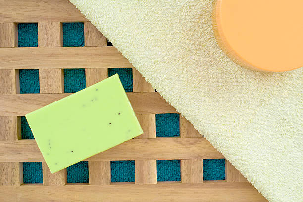 istock bath towels and soap on wooden background 522913111