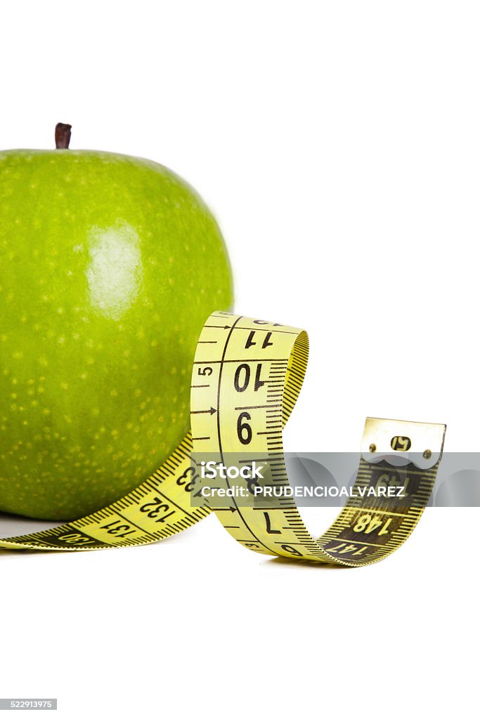 healthy diet apple with tape measure, concept of healthy eating, lifestyle Apple - Fruit Stock Photo