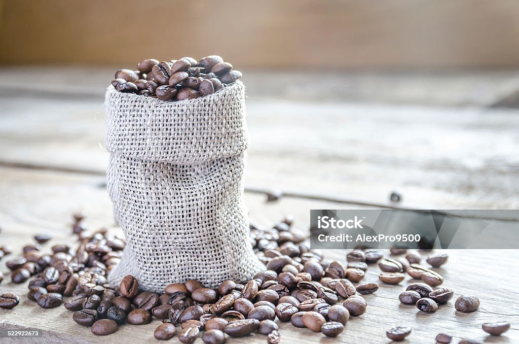 Coffee beans in the sackcloth bag Agriculture Stock Photo