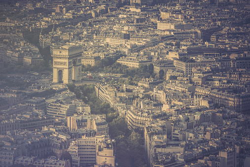 Old photo with aerial view of Dome des Invalids, burial site of Napoleon Bonaparte. Border filter applied and vintage processing.