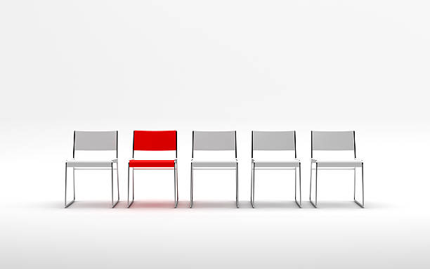 istock White chairs with a red chair. advantage 522926443