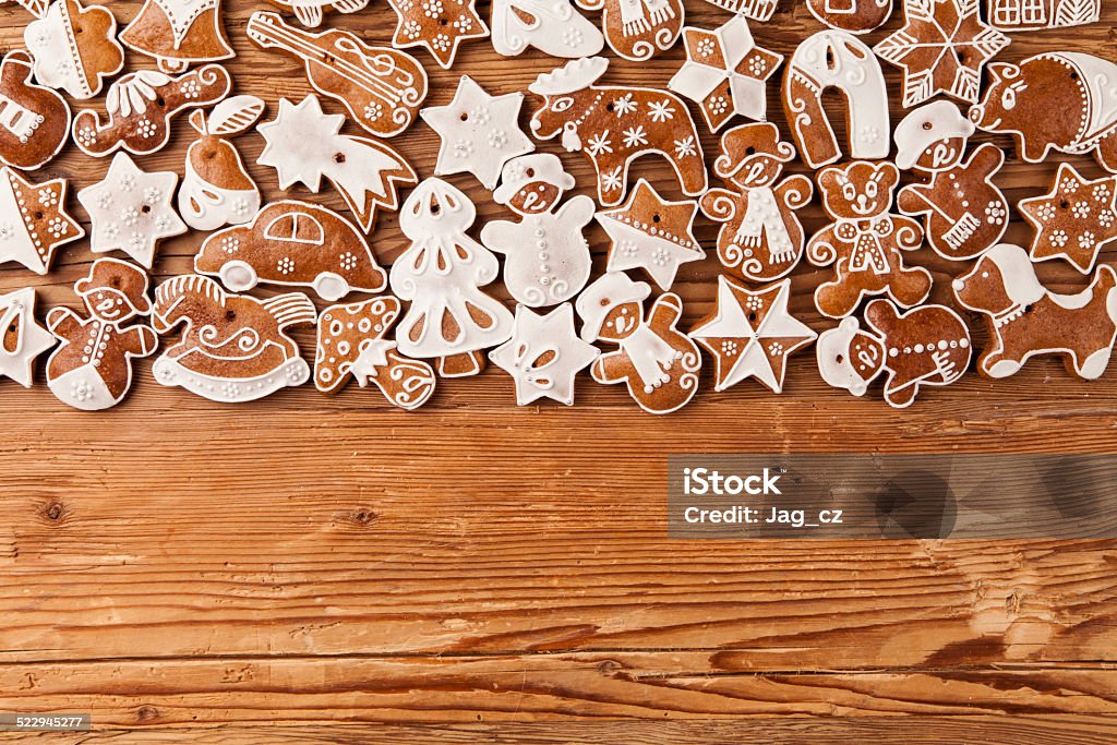 Christmas gingerbread cookies Traditional gingerbread hanging on wooden background Art And Craft Stock Photo