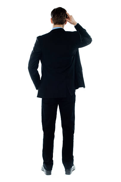 istock Back-pose of a corporate person standing 522946425