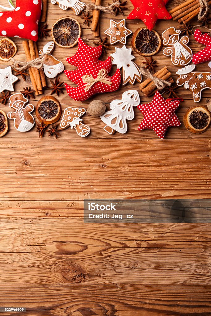 Christmas gingerbread cookies Traditional gingerbread hanging on wooden background Art And Craft Stock Photo