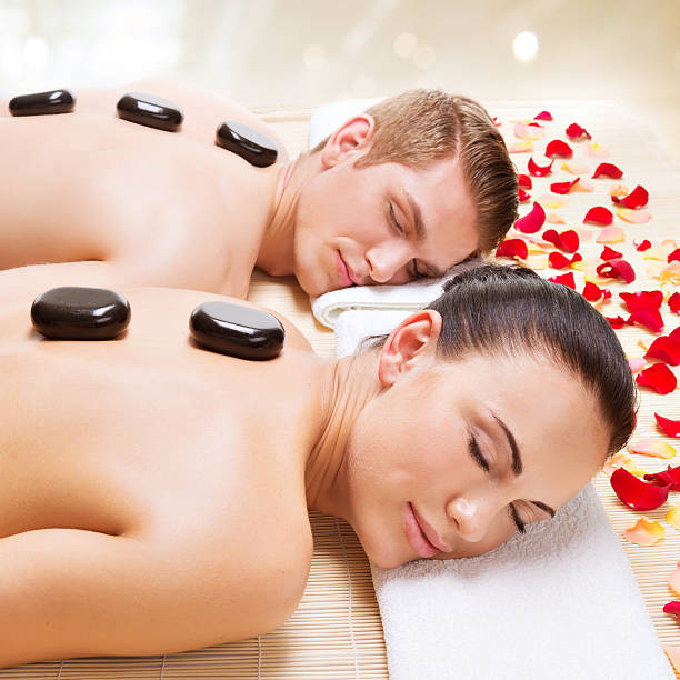 istock Attractive couple relaxing in spa salon. 522947509