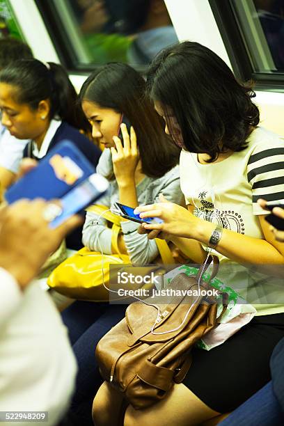 Messaging And Phone Talking Stock Photo - Download Image Now - Adult, BTS Skytrain, Bangkok