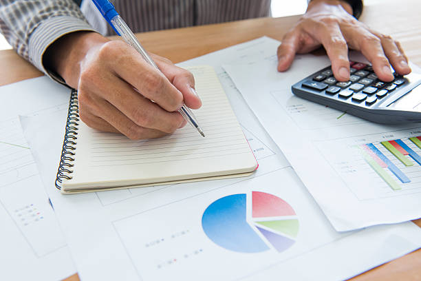 istock Businessman analyzing investment charts with laptop. Accounting 522948501