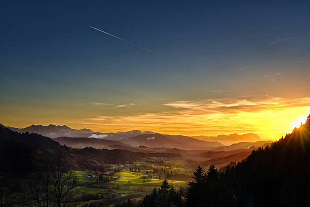 spectacular sunset over landscape at European alps in autumn View from Allgäu in Germany (Obersdorf) over the Austrian Vorarlberg till to the Alpstein and Mountain Säntis in Switzerland in the background. allgau stock pictures, royalty-free photos & images