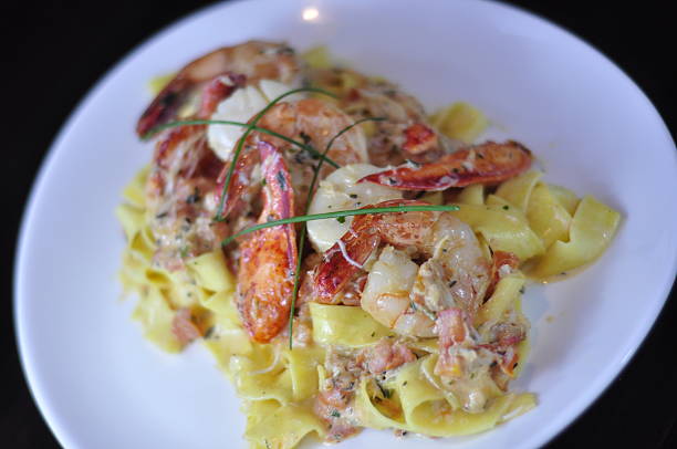 istock Sauteed Seafood over Pasta with Light Sauce 522950273
