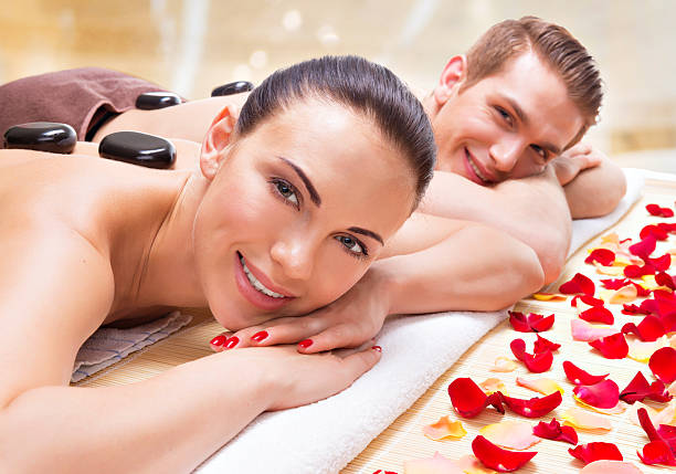 istock Happy smiling couple relaxing in spa salon. 522959977