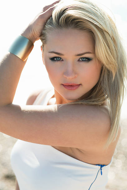 istock young beautiful woman blonde poses on a beach 522961035