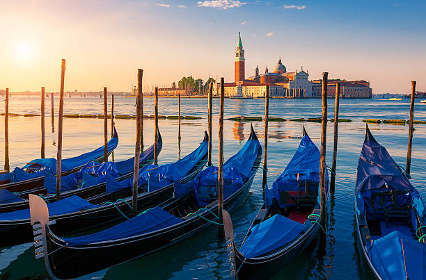 istock Beautiful view of Venice with gondolas at sunrise 522961145