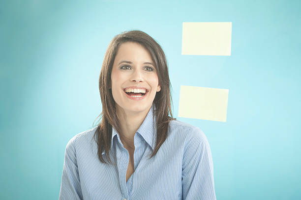 istock Businesswoman looking at adhesive notes, smiling 522963321