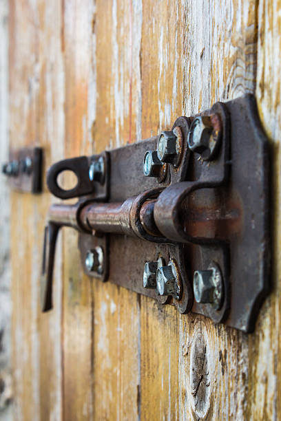istock old bold on a wood door 522964931
