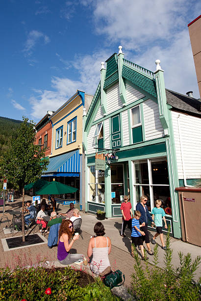 Revelstoke British Columbia in Summer Revelstoke, British Columbia, Canada - August 19, 2014: The historic downtown core of Revelstoke, British Columbia. In the heart of the Monashees and Purcells, Revelstoke receives more snowfall than most places in North America and is a skiers paradise. In summer it has a vibrant arts scene. revelstoke stock pictures, royalty-free photos & images